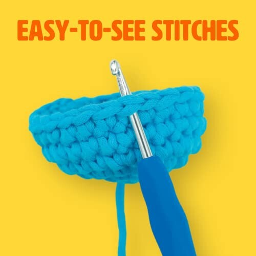 Crochet hook and blue yarn with easy-to-see stitches