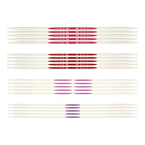 Set of knitting needles in red and pink.